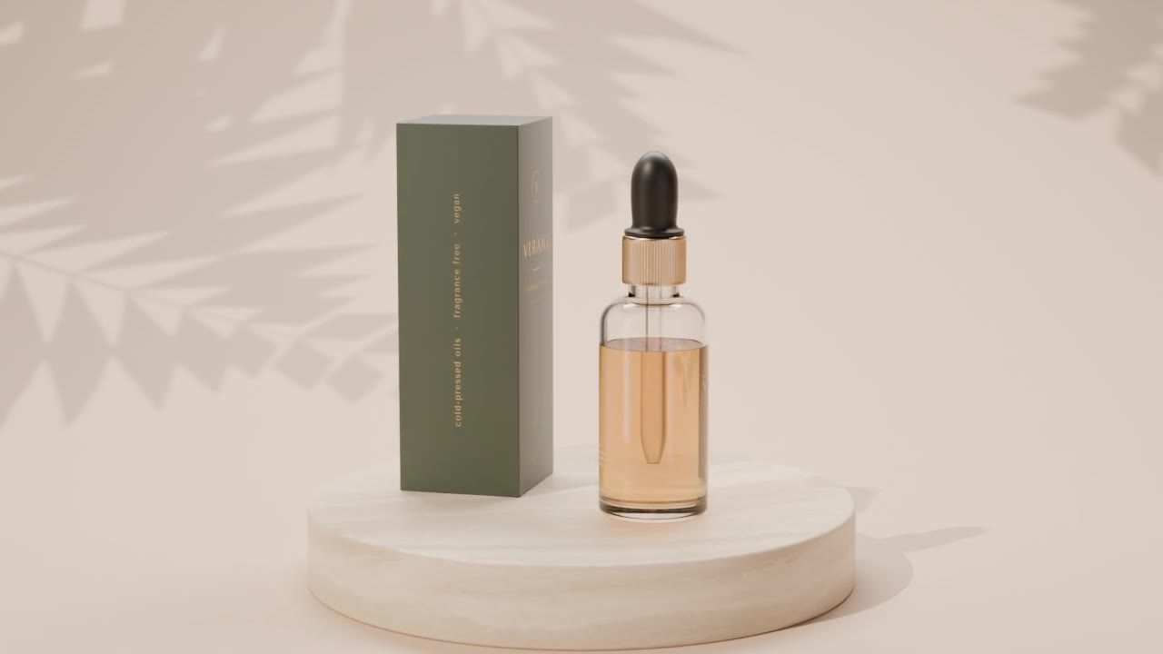 Frame from the product turntable: serum bottle and carton on a travertine plinth
